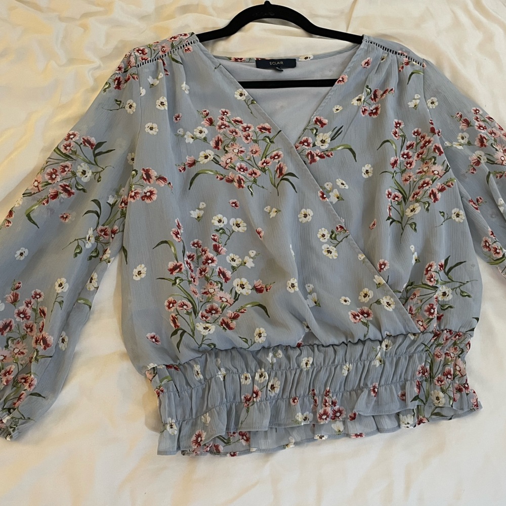 Baby-blue floral blouse by ECLAIR
